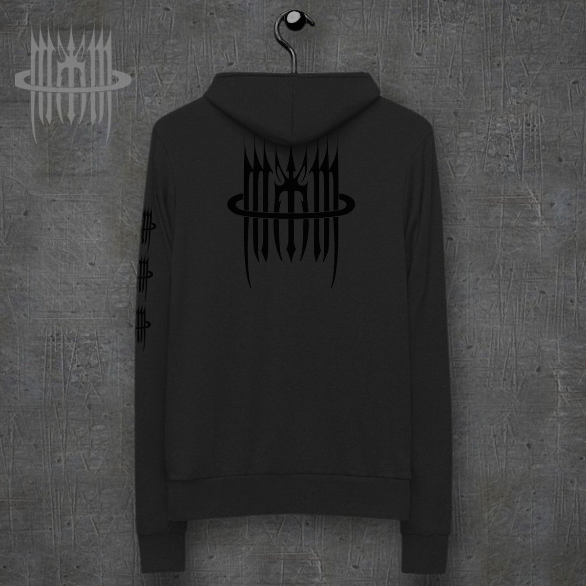 MK0KM Unisex xxx zip hoodie – back view, dark concrete background