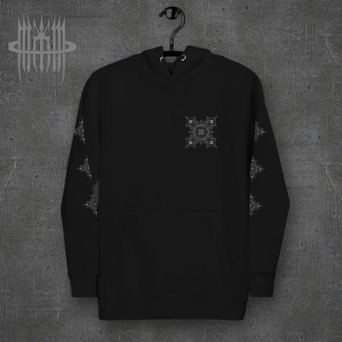 MK0KM Unisex Hoodie – black, front view, dark concrete background